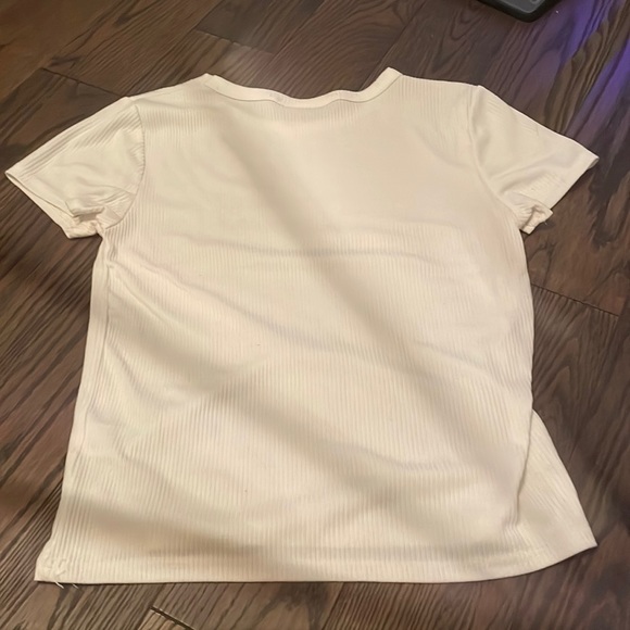 Two size s all white shirts super cute when I bought them they came together. - Picture 4 of 4